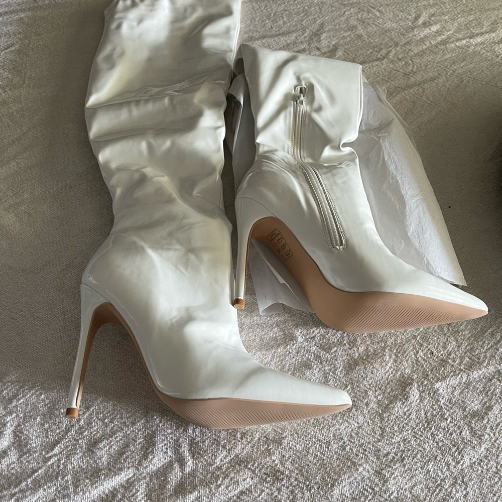 White knee high boots